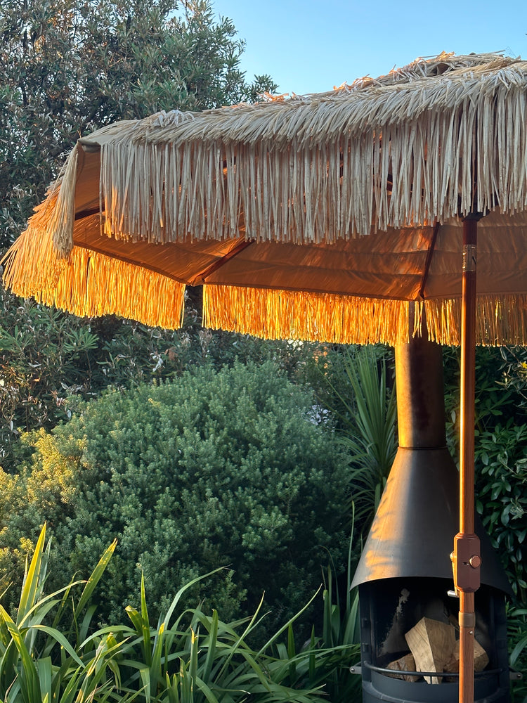 Hula 275cm MARKET Umbrella with crank lift - Raffia ThatchBring the charm and the lifestyle of the islands to your home or business with this hula shade umbrella. This nine-foot (275cm) raffia thatch umbrella is the perfectBeachkit