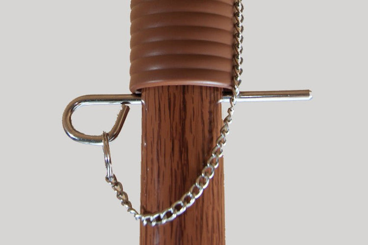 Close-up of locking mechanism on Hula 240cm shade canopy raffia thatch umbrella pole