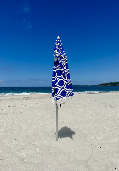 Hollie & Harrie Classic Fringe 210cm Canvas Beach Umbrella - Moroccan The Fringe 210cm Beach Umbrella is a classic beach lovers staple. The thick &amp; luxurious 100% cotton canopy with a retro fringe makes for an Instagram worthy picnBeachkit