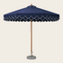 A navy blue patio umbrella with a scalloped white trim along the edge of the canopy, a brown wooden pole, and a round gray stone base on a white background.