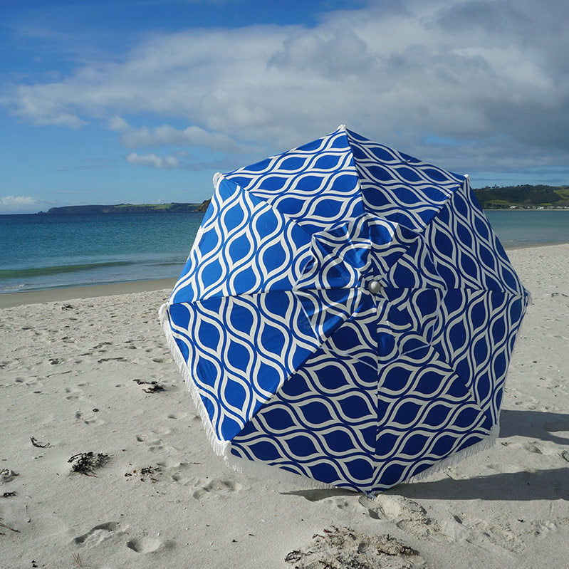 Hollie & Harrie Classic Fringe 210cm Canvas Beach Umbrella - Moroccan The Fringe 210cm Beach Umbrella is a classic beach lovers staple. The thick &amp; luxurious 100% cotton canopy with a retro fringe makes for an Instagram worthy picnBeachkit