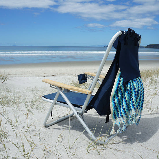 Wearever Backpack Chair - NavyOur top quality Wearever Backpack Chair combines the concept of a backpack and a high back chair all in one, creating an easy to carry lounger.  
The Beachkit WearevBeachkit